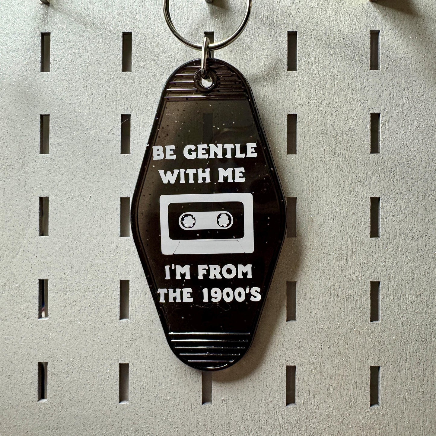Be gentle with me I'm from the 1900s - black glitter motel style keychain