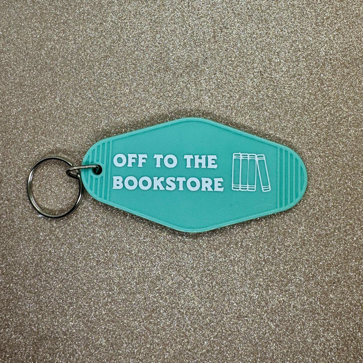 Off to the bookstore - Motel Keychain