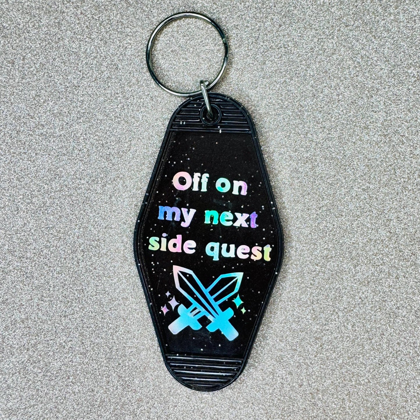 Off on my next side quest - Glitter Black Motel Keychain
