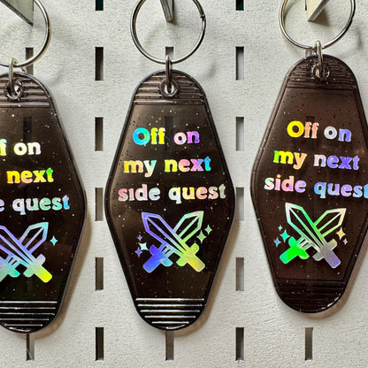 Off on my next side quest - Glitter Black Motel Keychain
