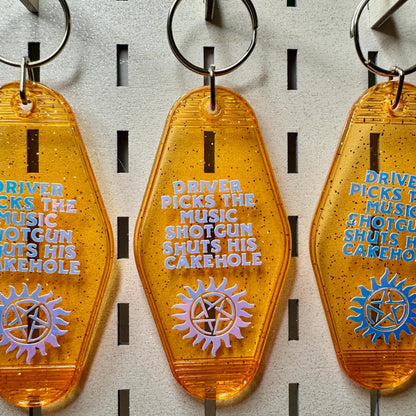 Driver picks the music shotgun shuts his cakehole - Supernatural Keyring Motel Style glitter
