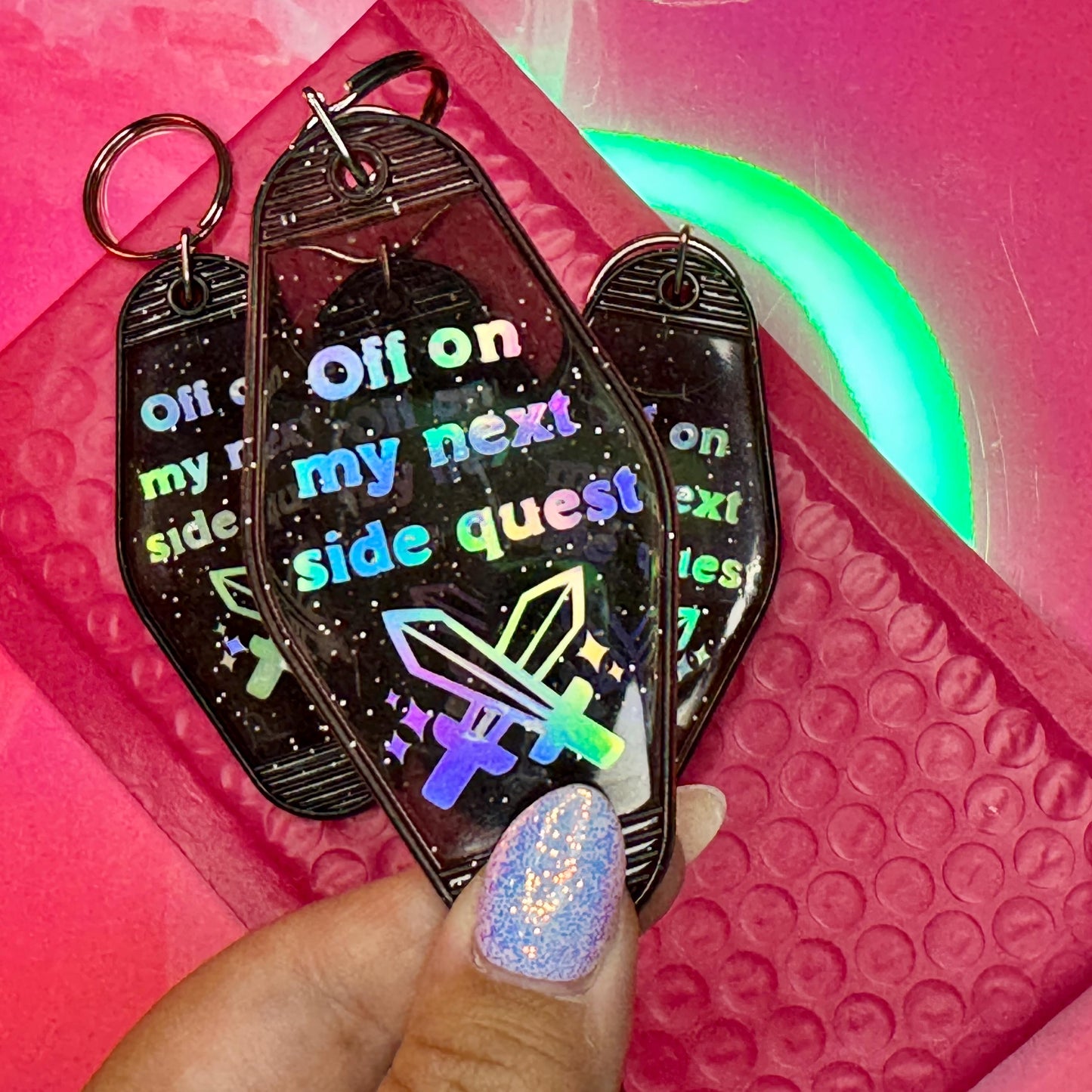 Off on my next side quest - Glitter Black Motel Keychain