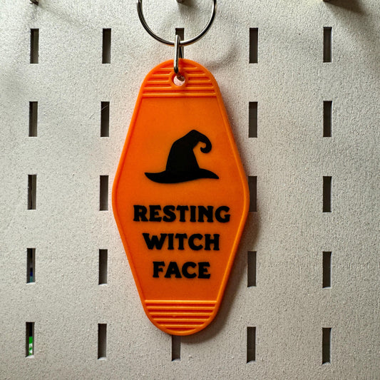 Resting Witch Face - Orange Motel style keyring