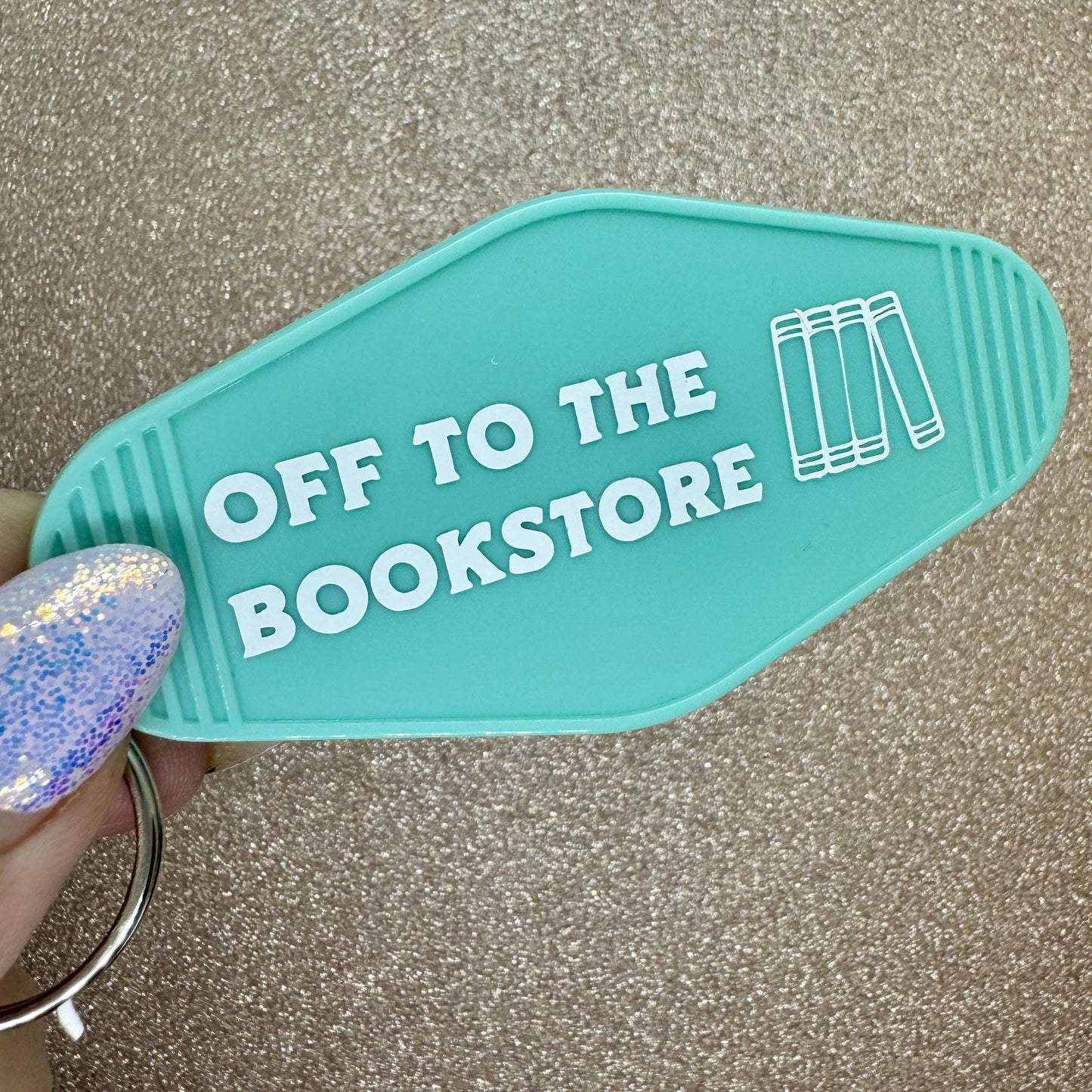 Off to the bookstore - Motel Keychain