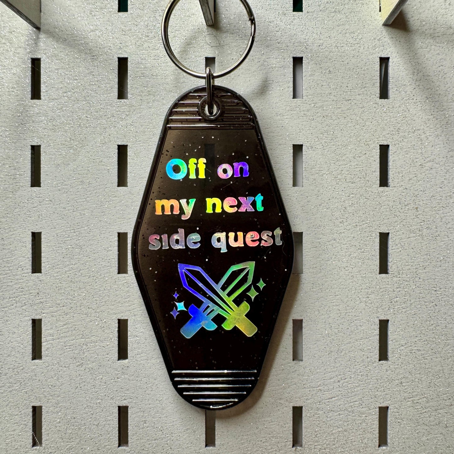 Off on my next side quest - Glitter Black Motel Keychain